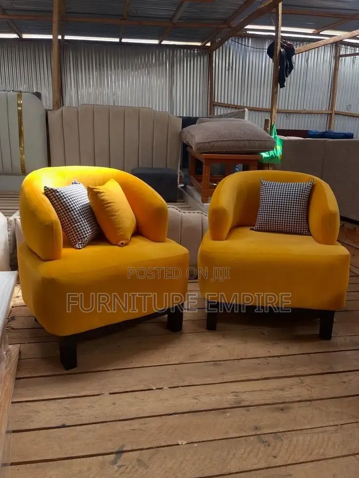 Vibrant Yellow Armchairs With Houndstooth Cushions