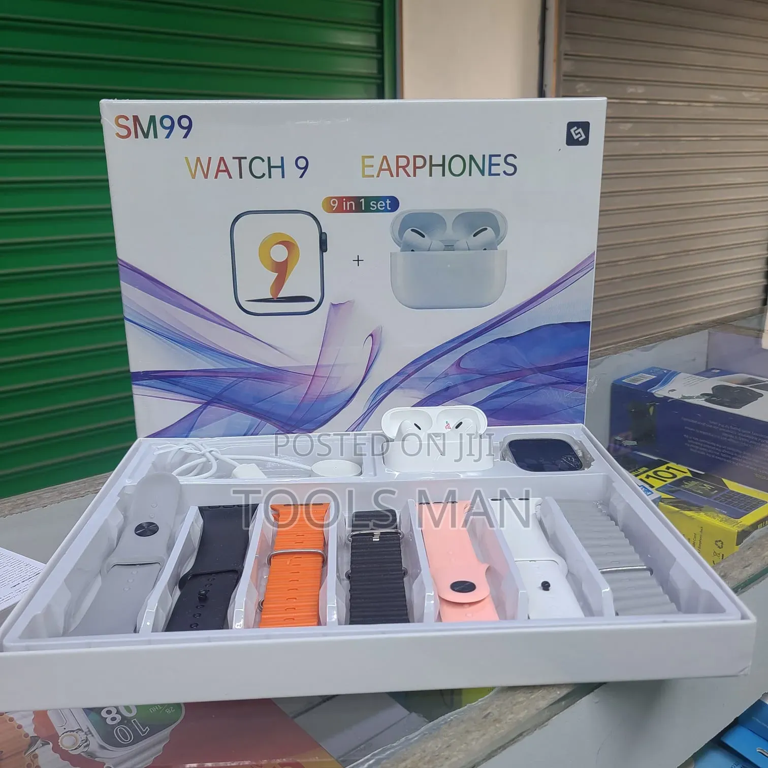 Sm99 Watch 9 Smartwatch + Wireless Earphones 9-in-1 Combo Set.