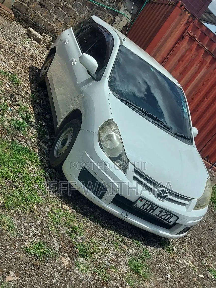 Mazda Familia 2015 White
