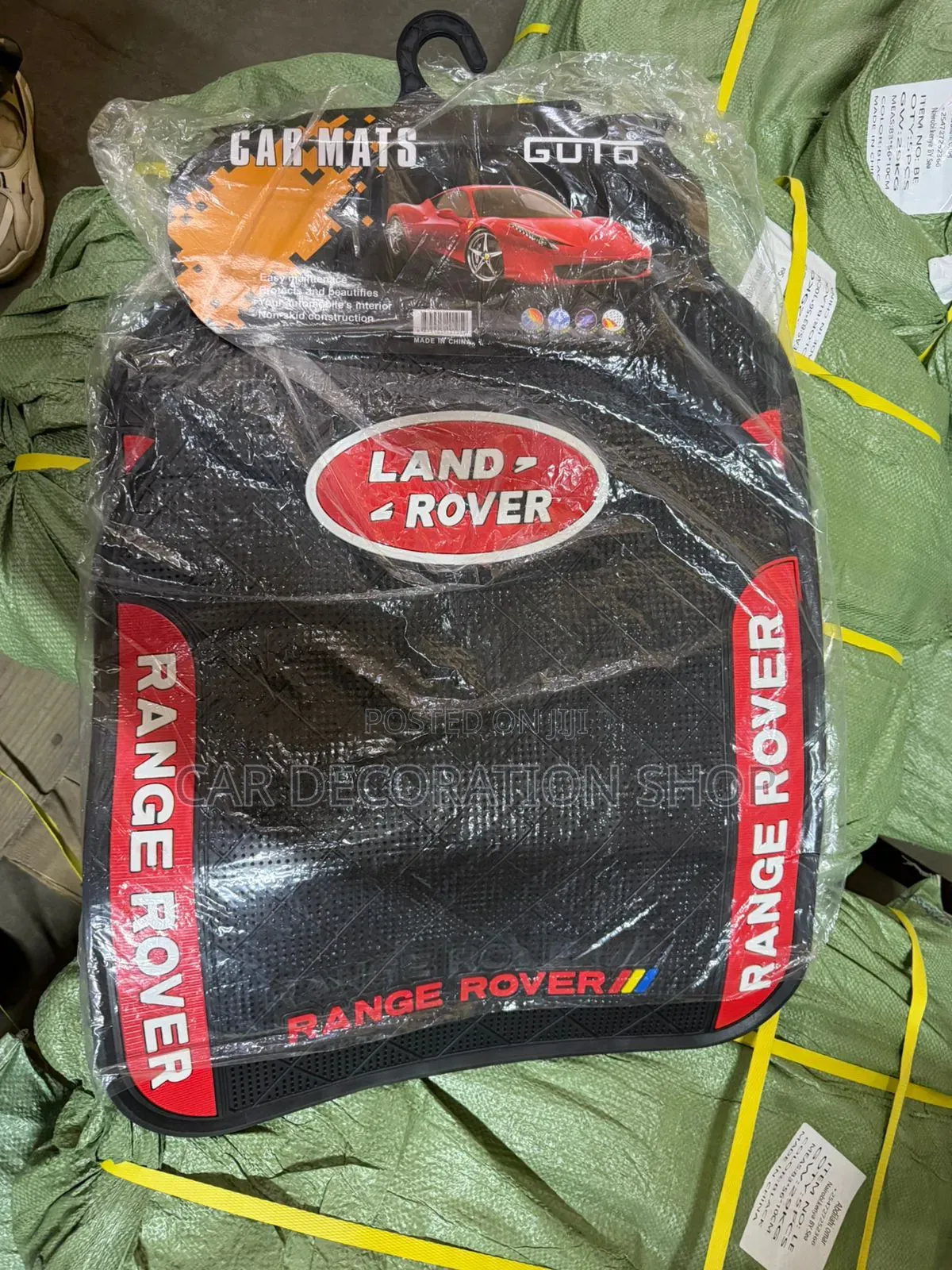 Red Logo Land Rover With Textured Grooves Intended to Trap Dirt