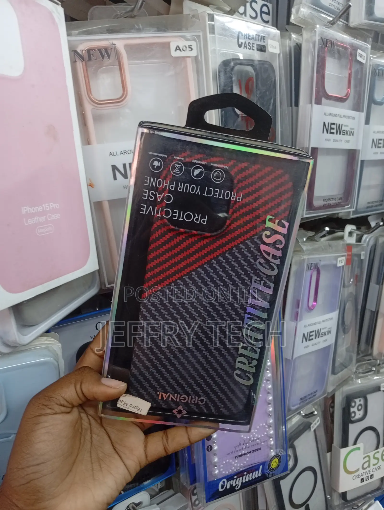 iPhone 16 Pro Max Red and Black Carbon Fiber Style Texture Cover