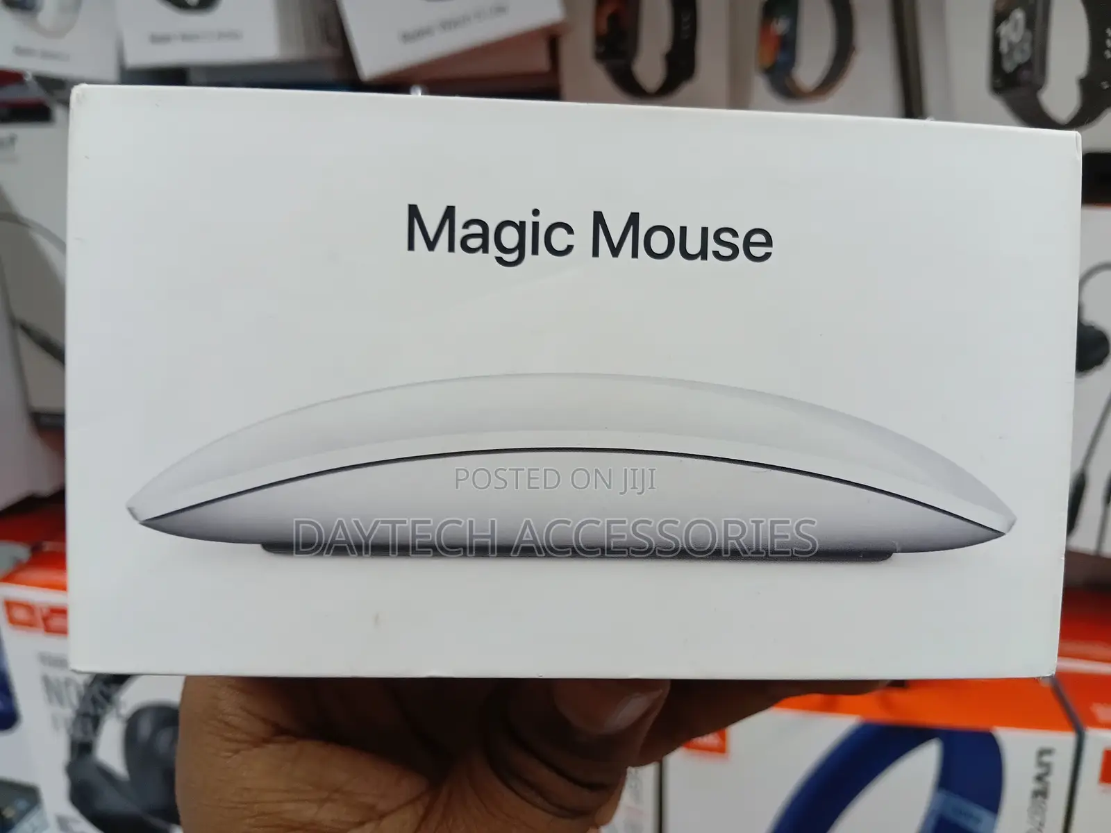 This Is an Apple Magic Mouse in White With a Multi-Touch Surface.