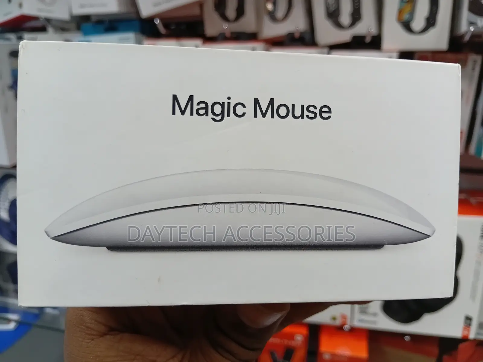 This Is an Apple Magic Mouse in White With a Multi-Touch Surface.