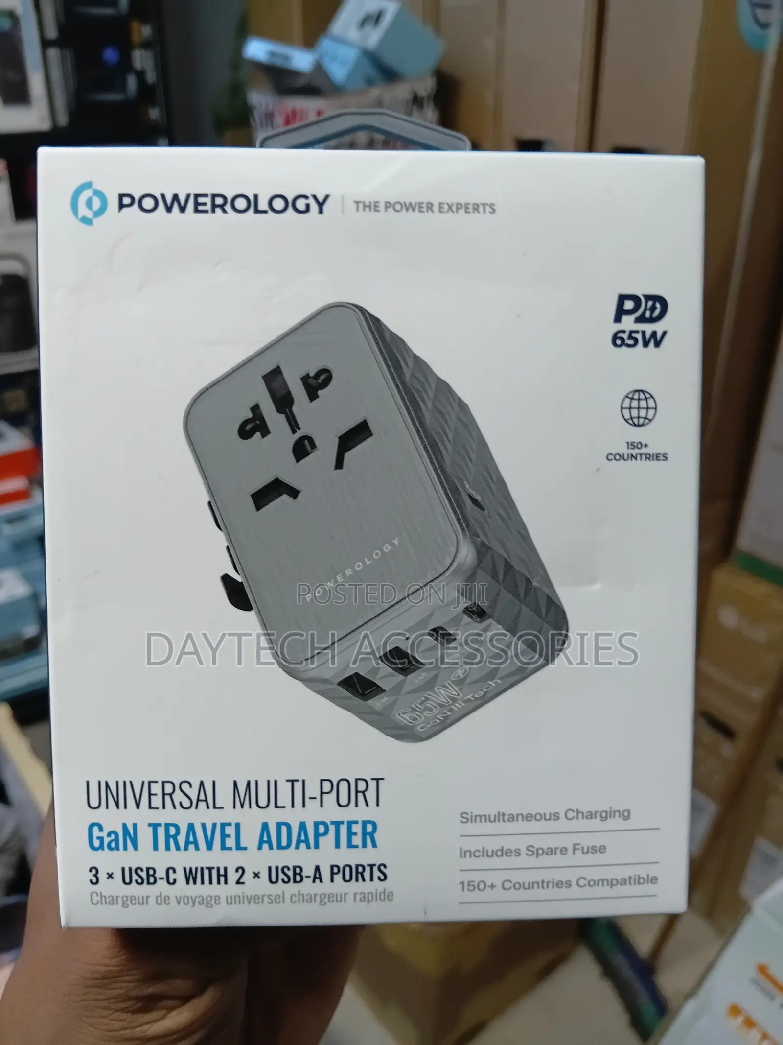 This Is a Powerology 65w Gan Universal Multi-Port Travel Adapter Grey.