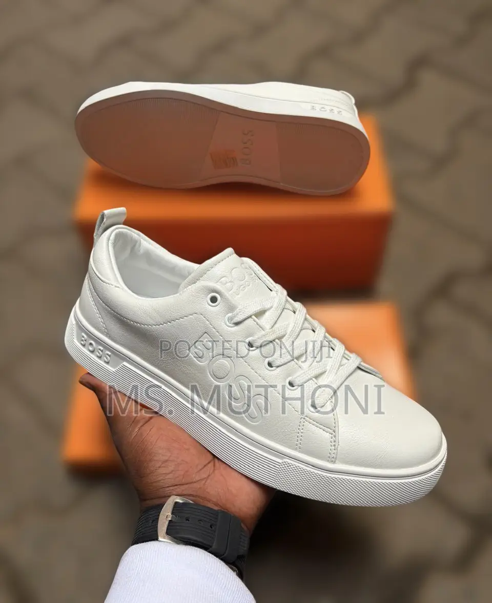 Hugo Boss Men's Leather Sneakers Featuring a Thick White Rubber Sole.