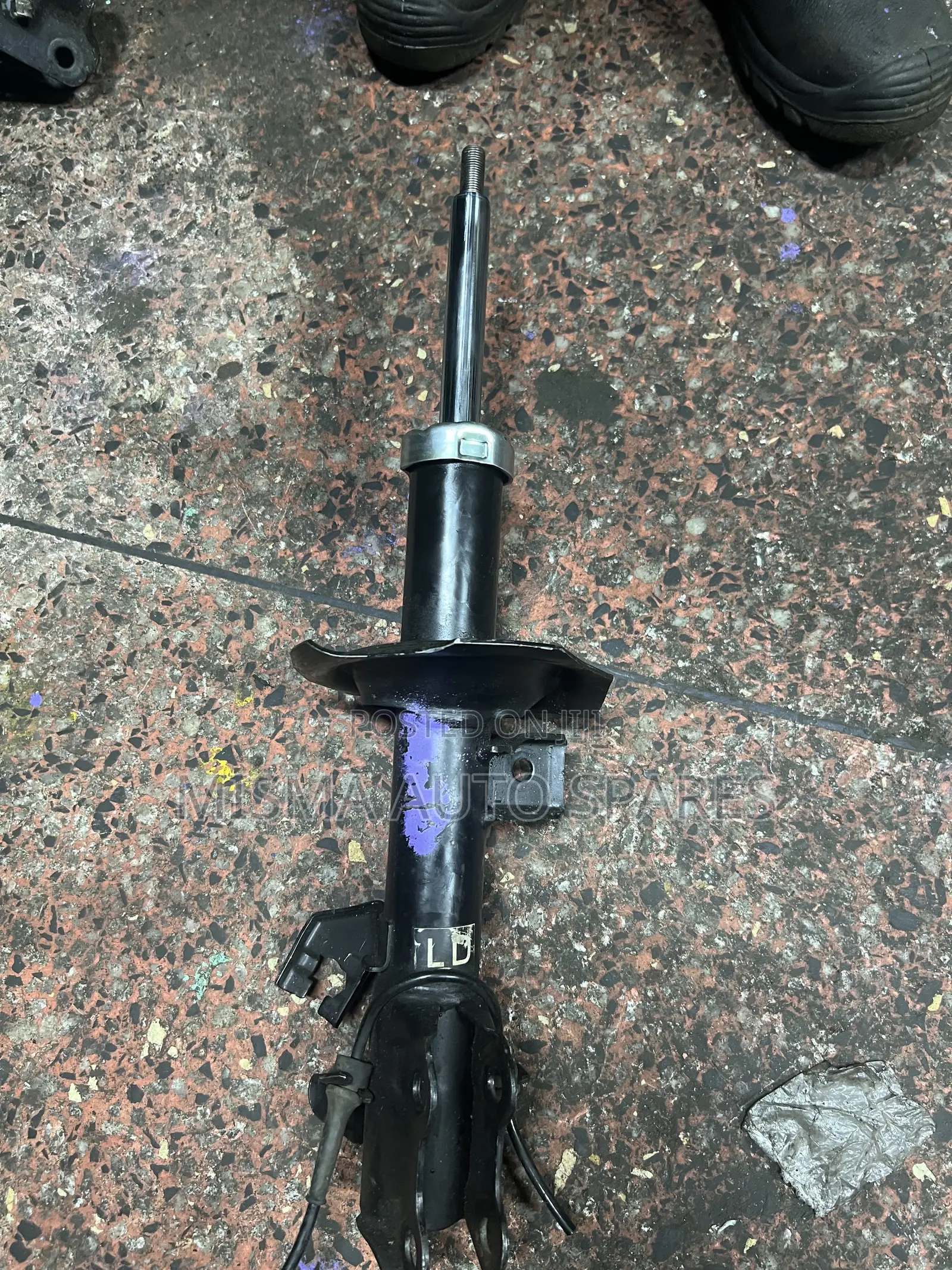Front Shock Nissan Tiida