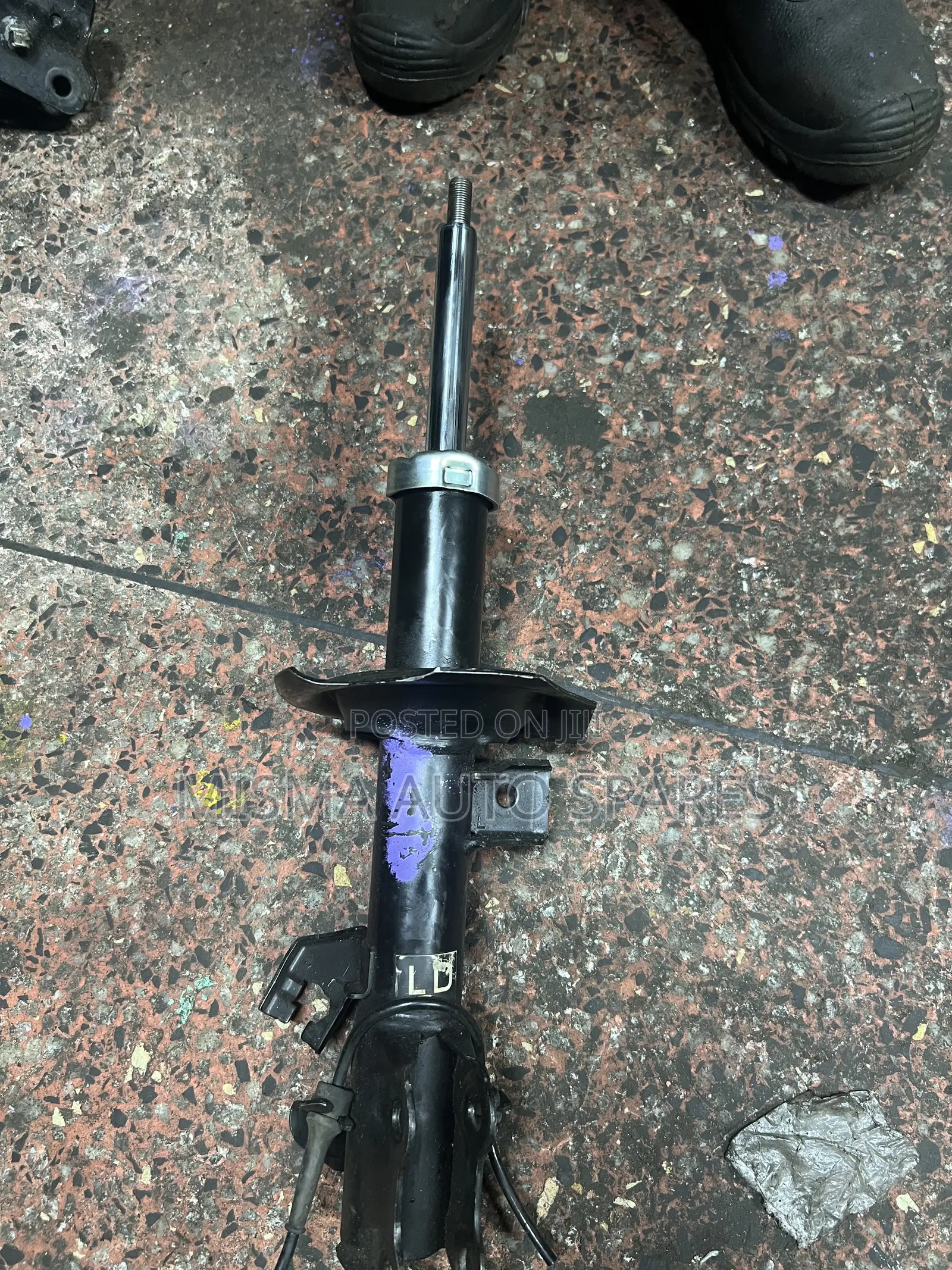 Front Shock Nissan Tiida