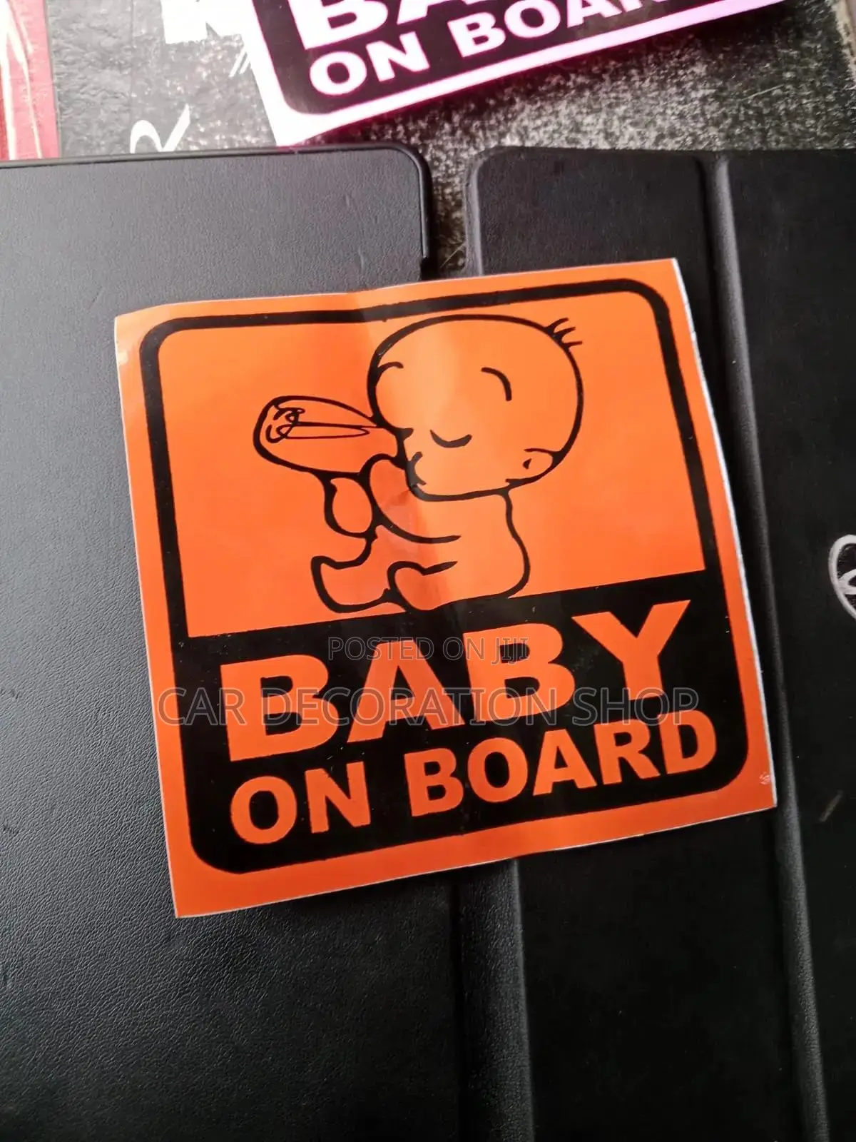 Orange Baby on Board Safety Stickers With Humorous Boss Baby