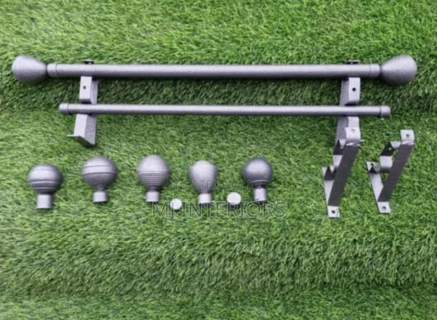 Modern Grey Curtain Rods With End Flowers and Wall Brackets