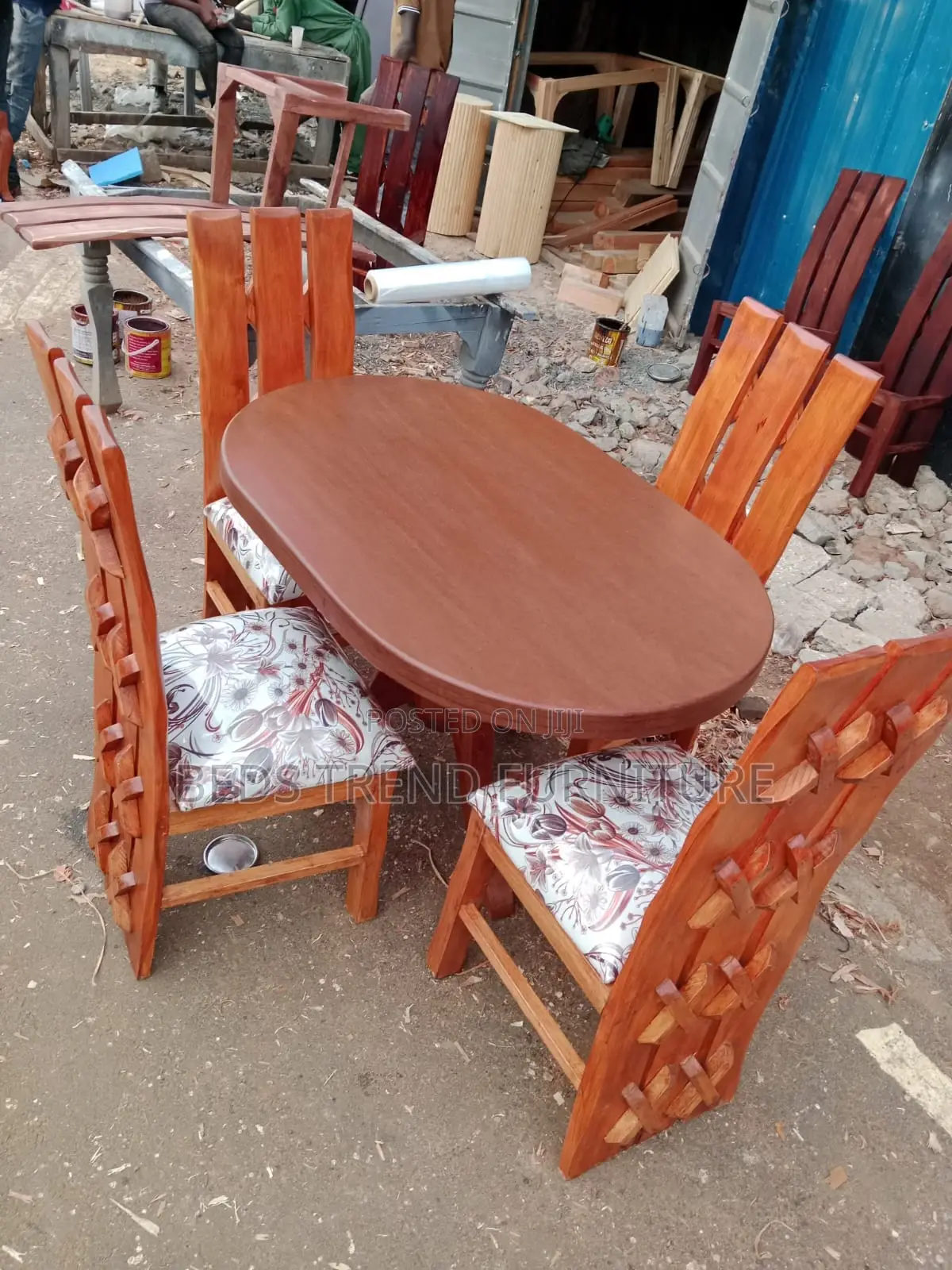 4-Seater Oval Wooden Dining Set With Floral Cushions