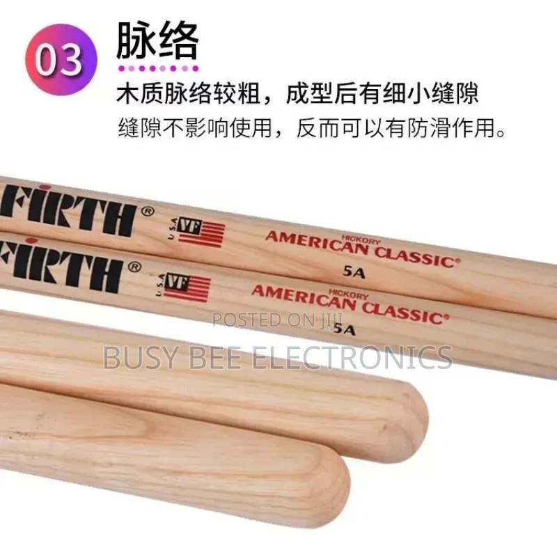 A Set of 2 5a Walnut Drumsticks, Perfect for Jazz Drummers.