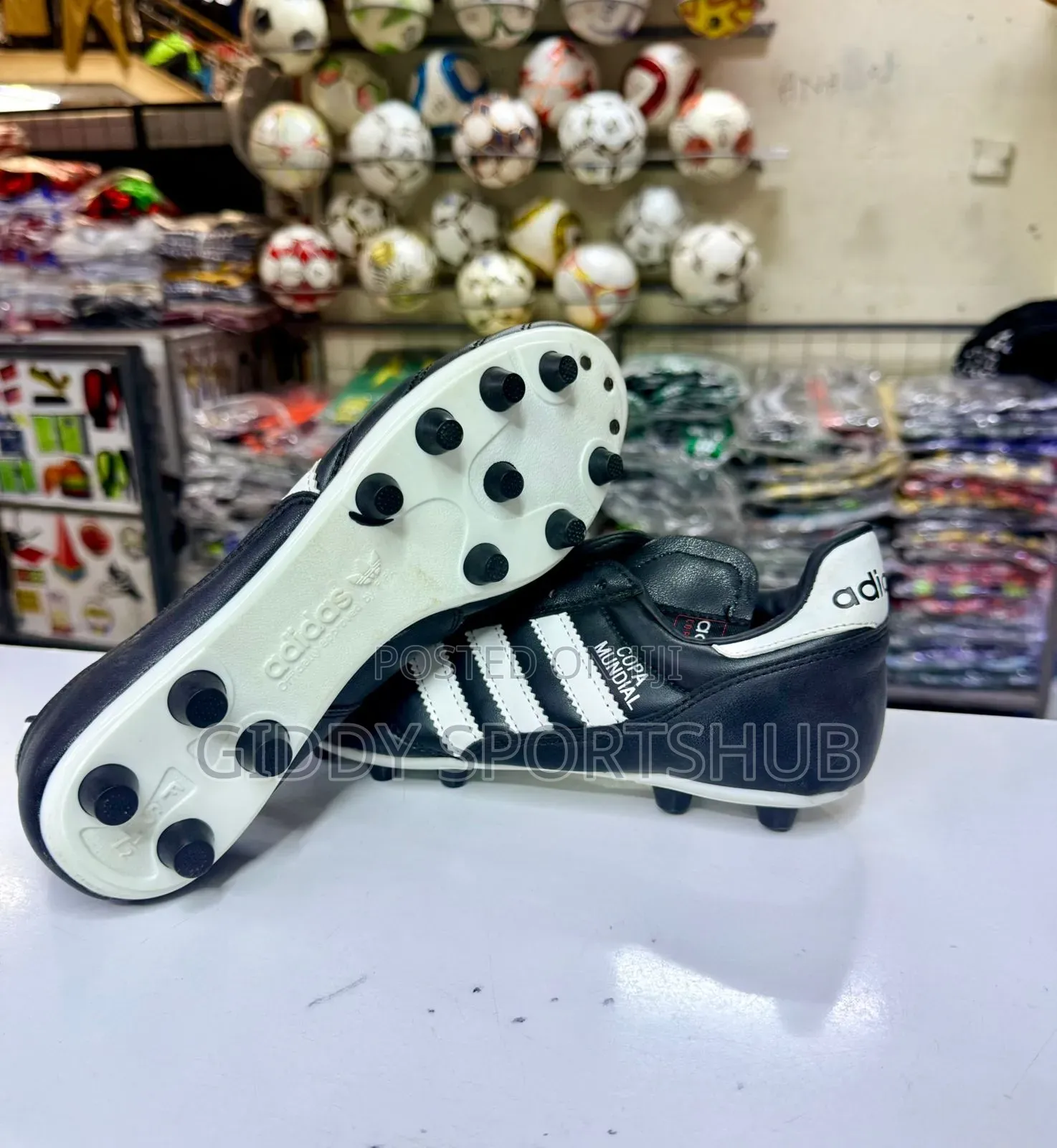 Black and White Copa Mundial Firm Ground Boots