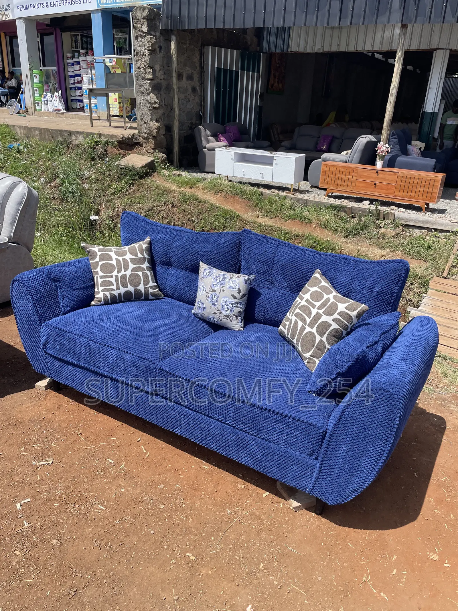 A Classic Three Seater Butterfly Super Sofa