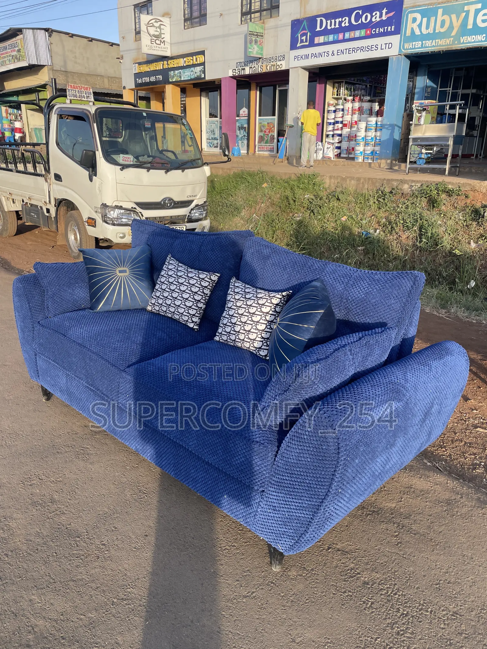A Classic Three Seater Butterfly Super Sofa