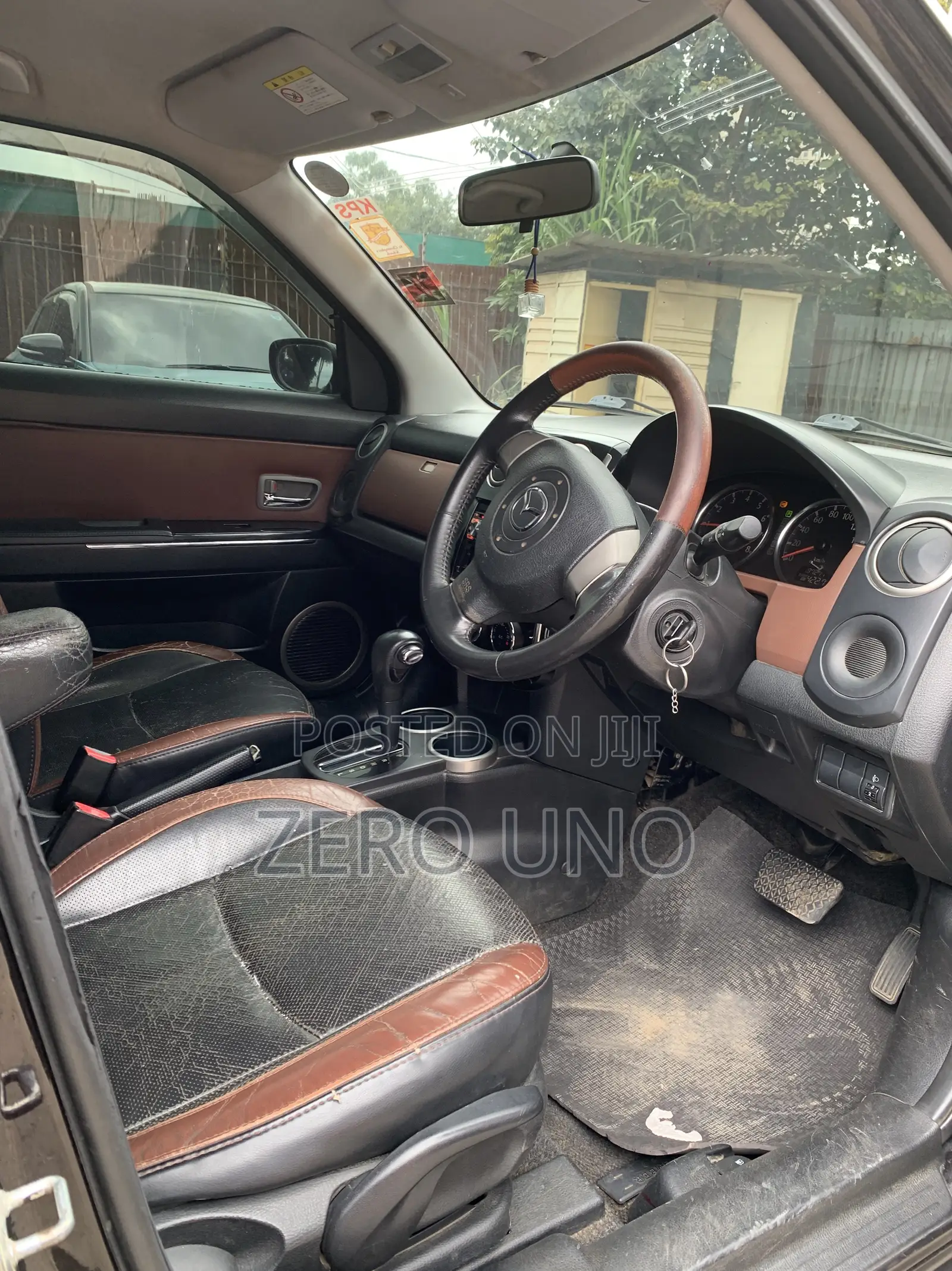 Mazda Verisa 2009 Maroon