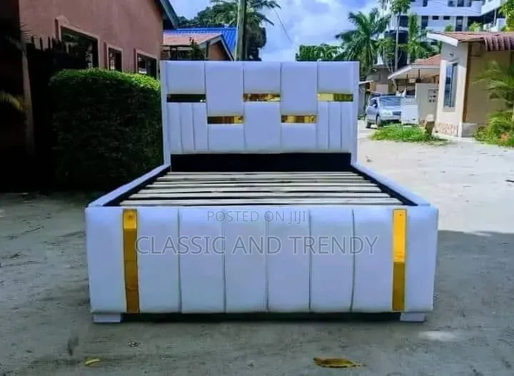 6x6 Chester Bed With Gold Accents.