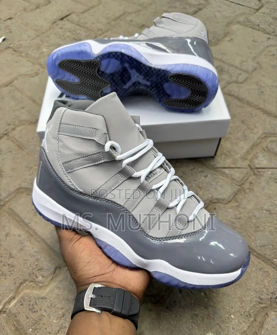 Nike Air Jordan 11 Retro Featuring a Unique Black Textured Mudguard