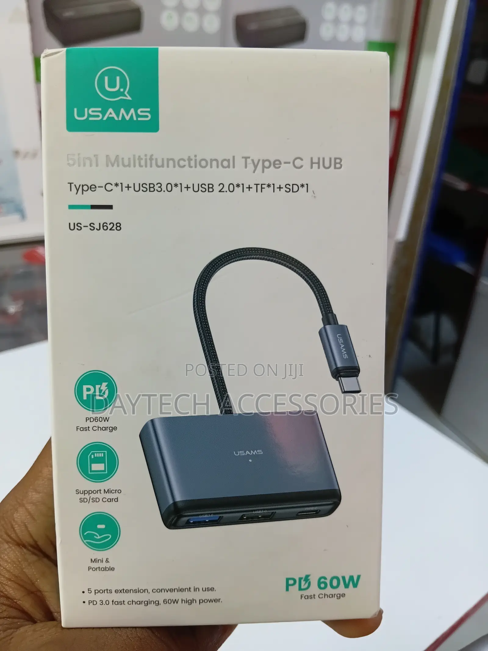 This Is a Usams Us-Sj628 5-in-1 Multifunctional Type-C Hub in a Gray.
