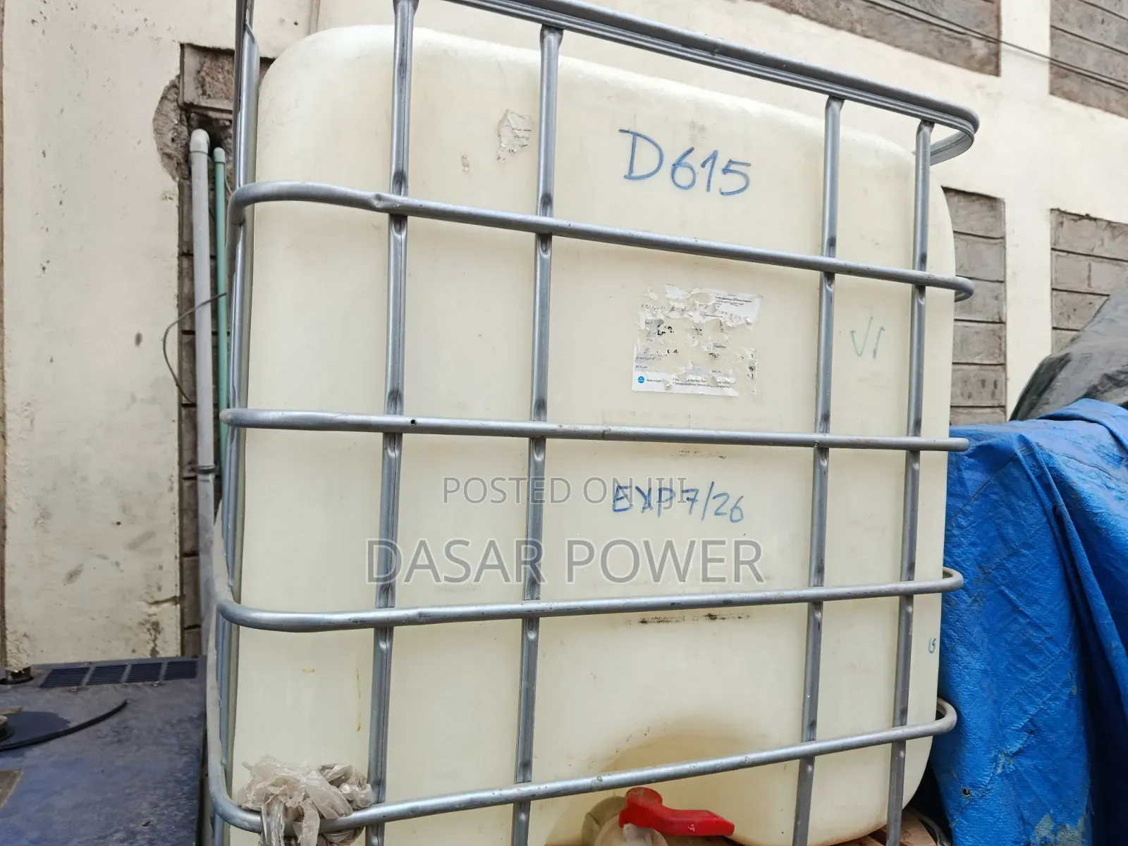 Caged 1000litre Plastic Tanks