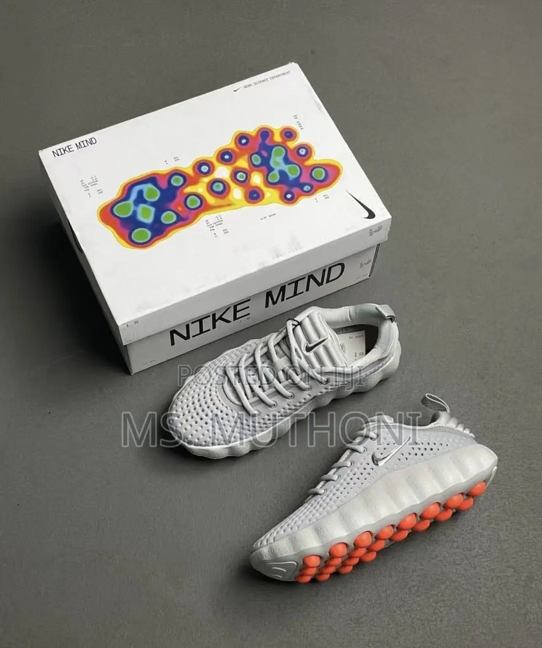 Nike Mind 002 Pregame Shoes in a Light Smoke Grey