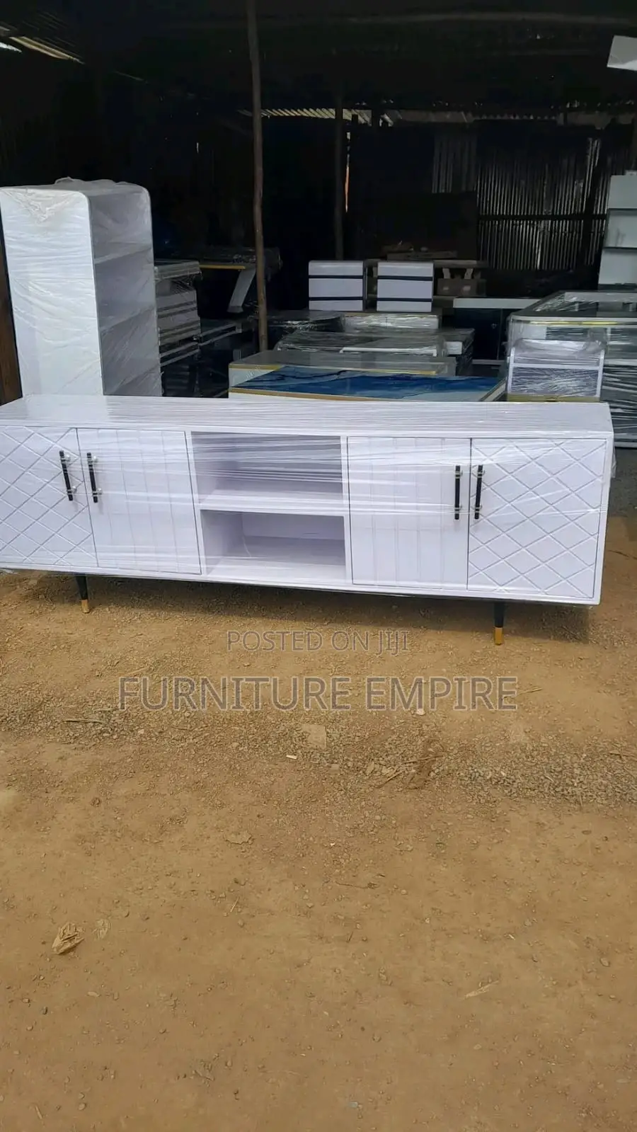 Modern White Tv Stand With Diamond Doors Gold-Tipped Legs