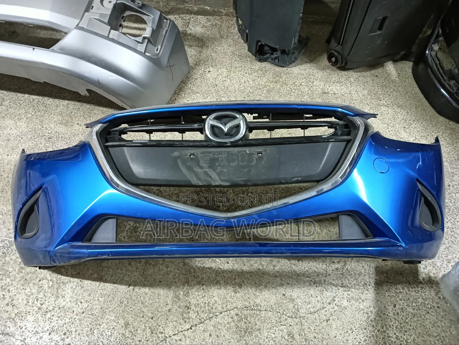 Mazda Demio Complete Front Bumper