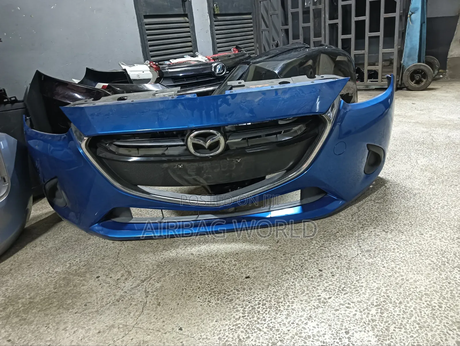Mazda Demio Complete Front Bumper