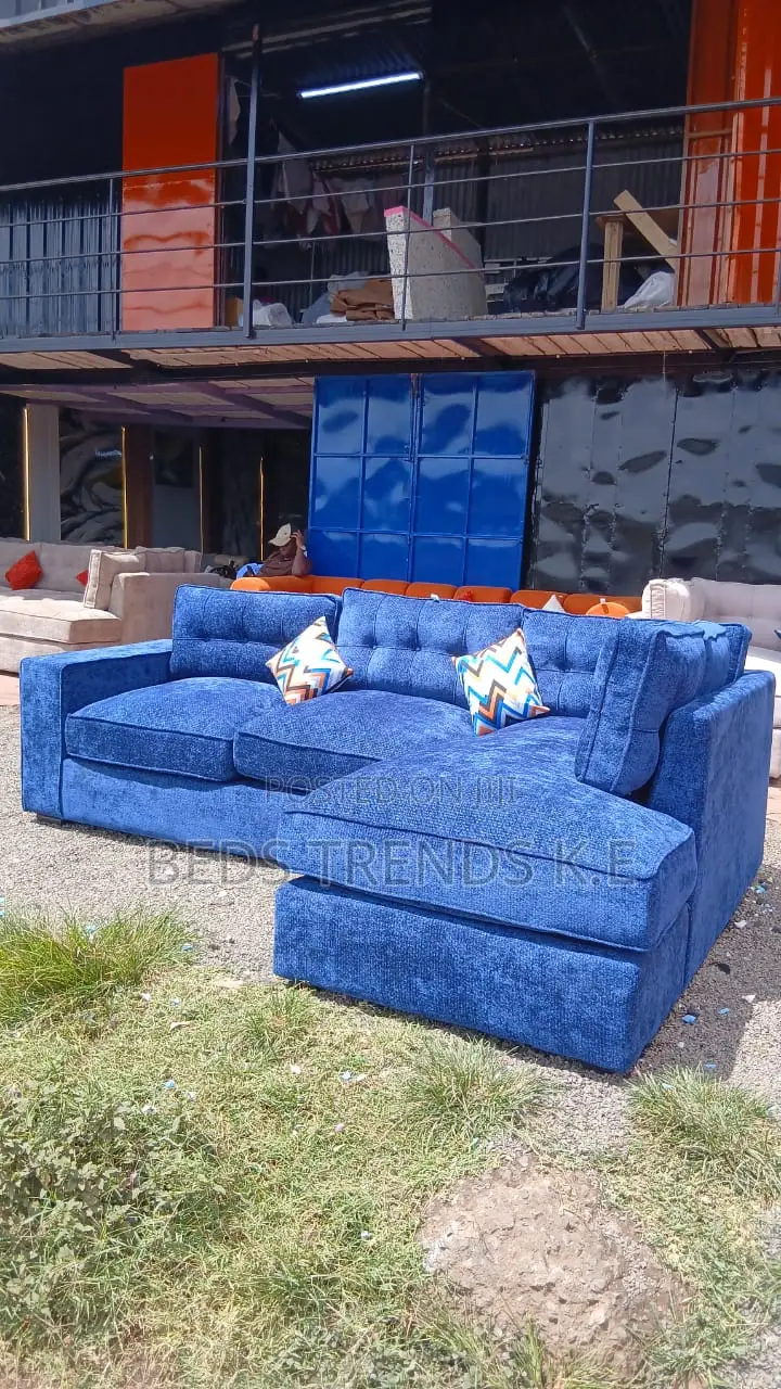 6 Seater Blue L Sofa With Cushions