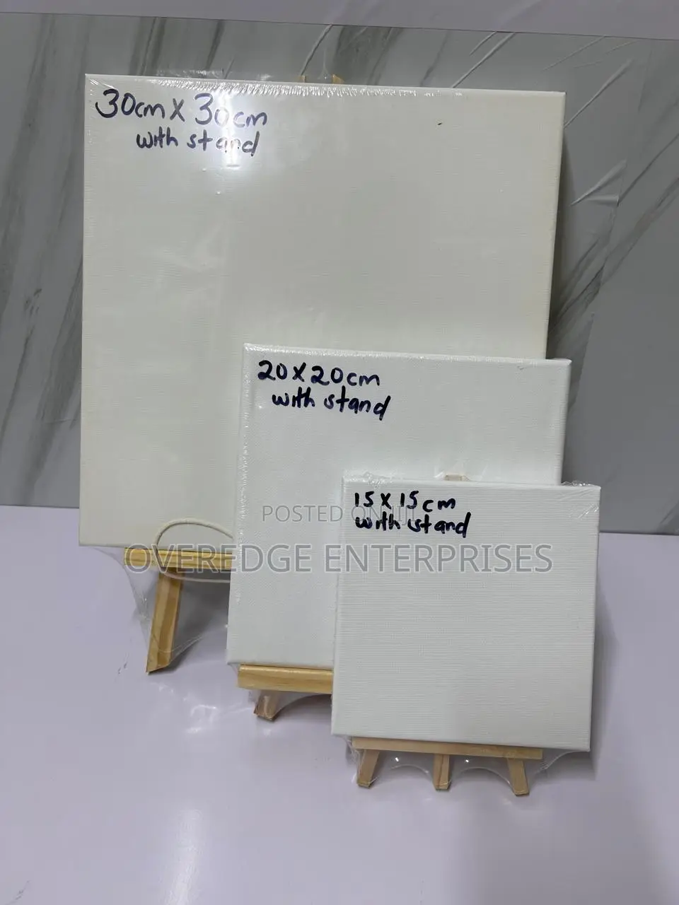 Painting Wooden Stands and Canvases