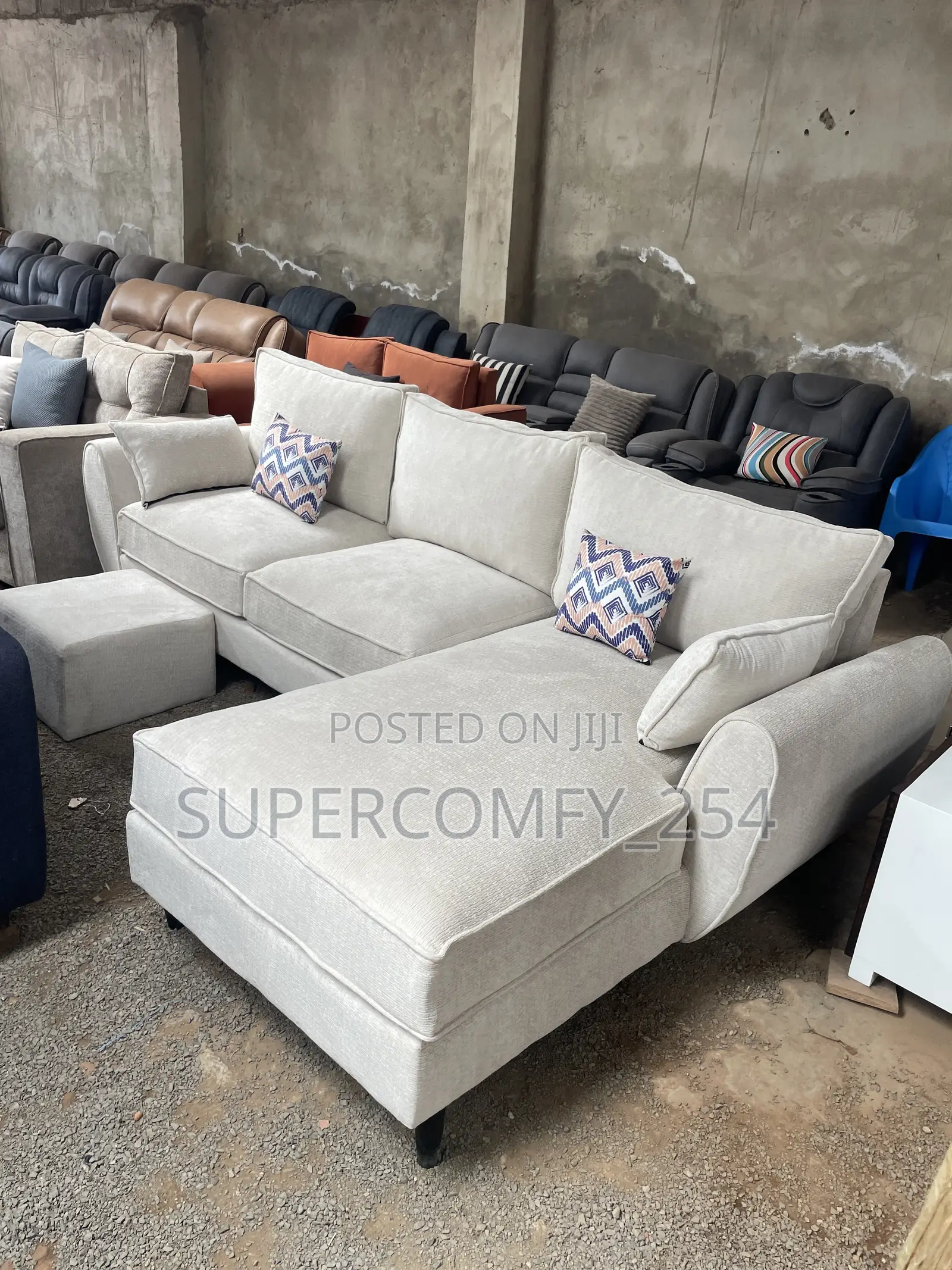 A White Butterfly Design L Shape Sofa