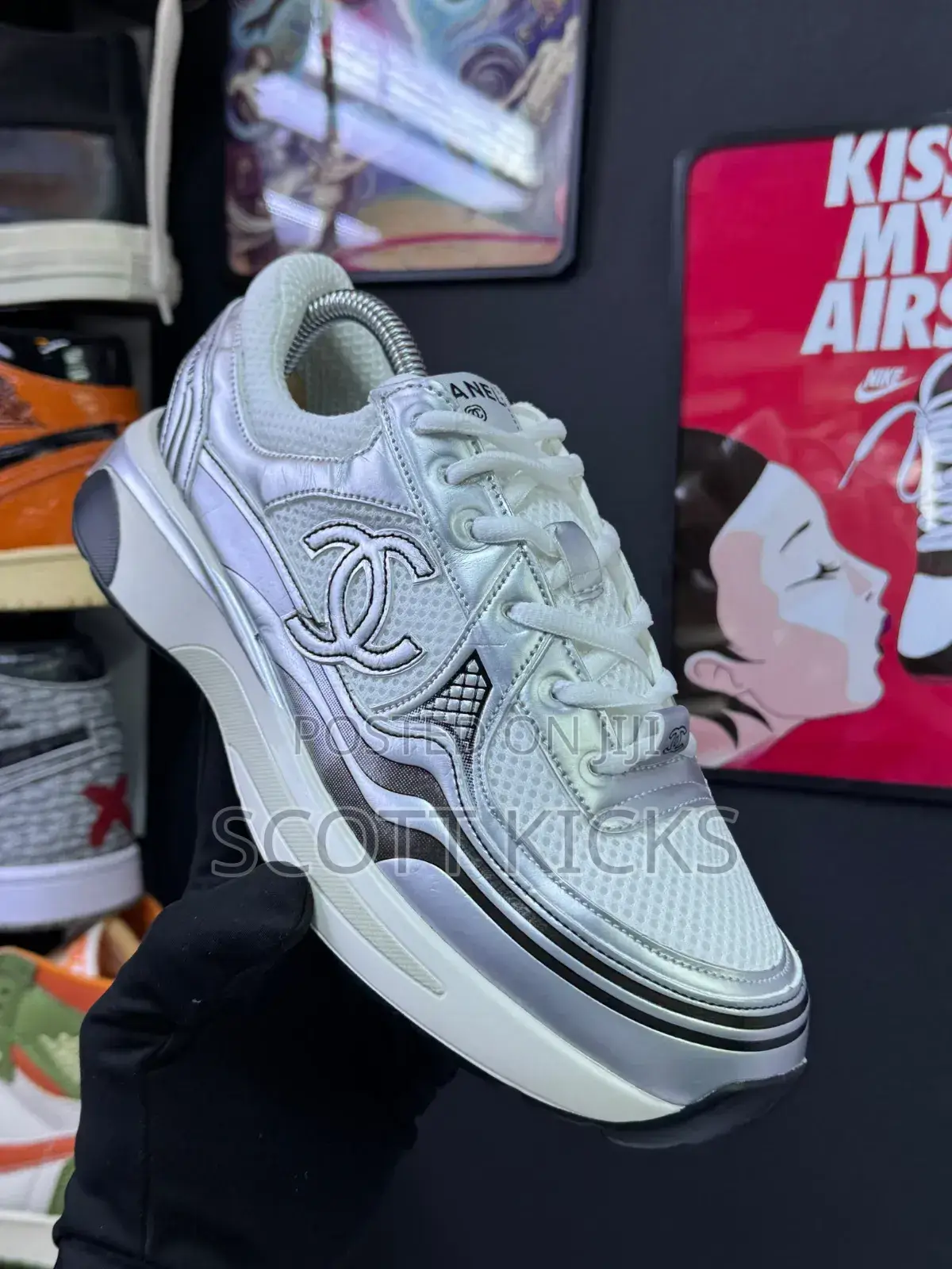 Chanel Trainers in White and Silver.
