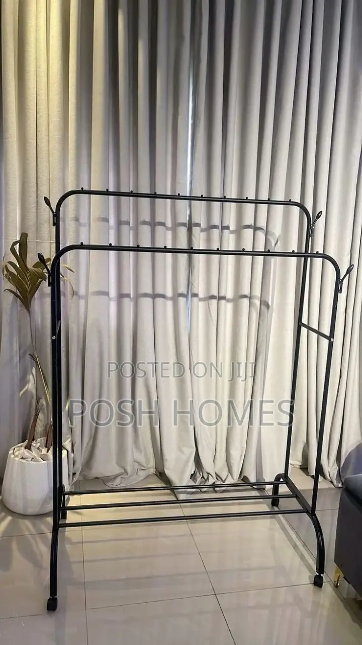 Double Pole Clothing Rack With Wheels Lower Storage Shelf