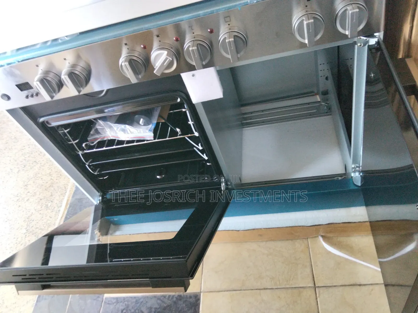 Haier 4+2 Cooker Size 90 by 60 With Gas Compartment