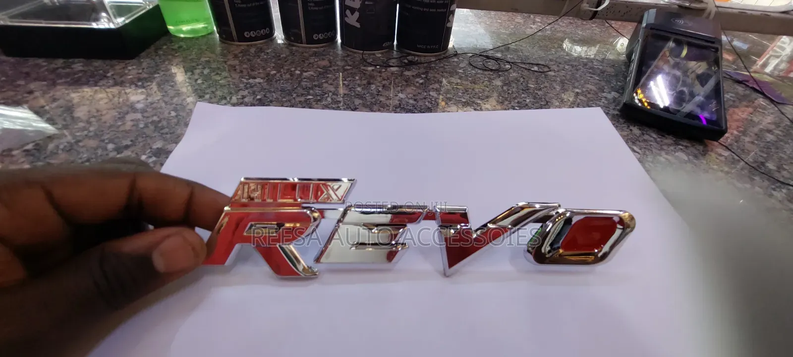 Emblem Hillux Revo