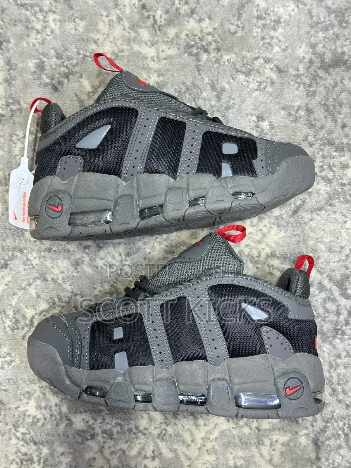 Nike Air More Uptempo Low Sneakers in a Dark Grey and Black