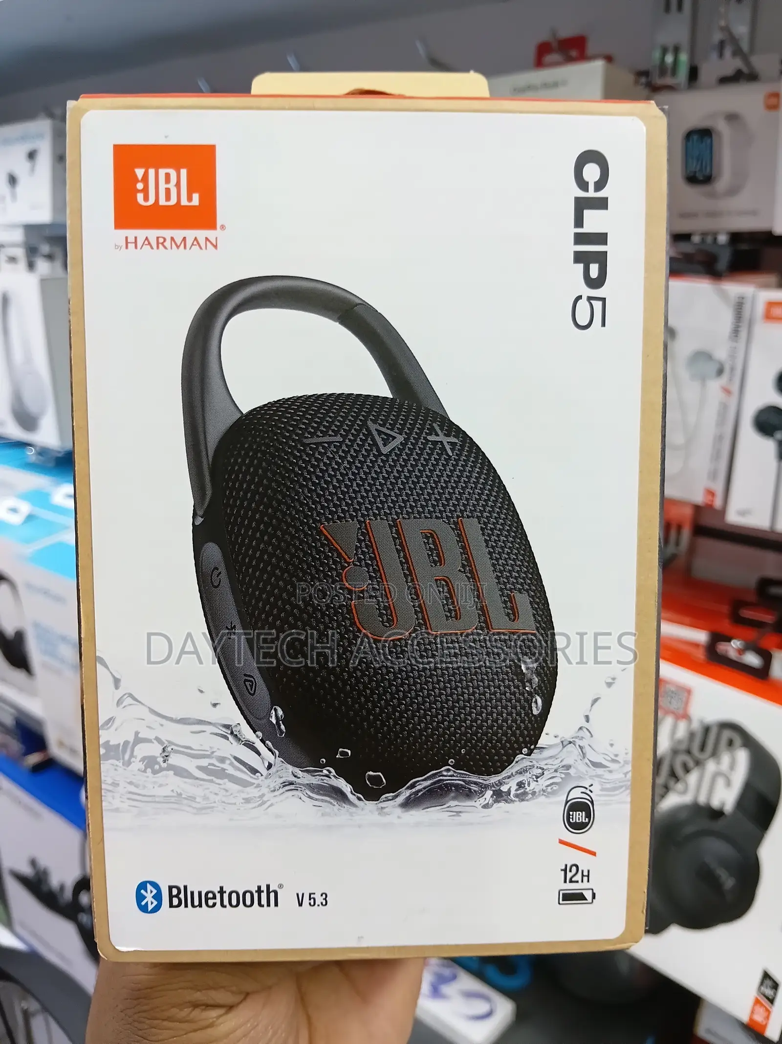 The JBL Clip 5 Ultra-Portable Waterproof Bluetooth Speaker.