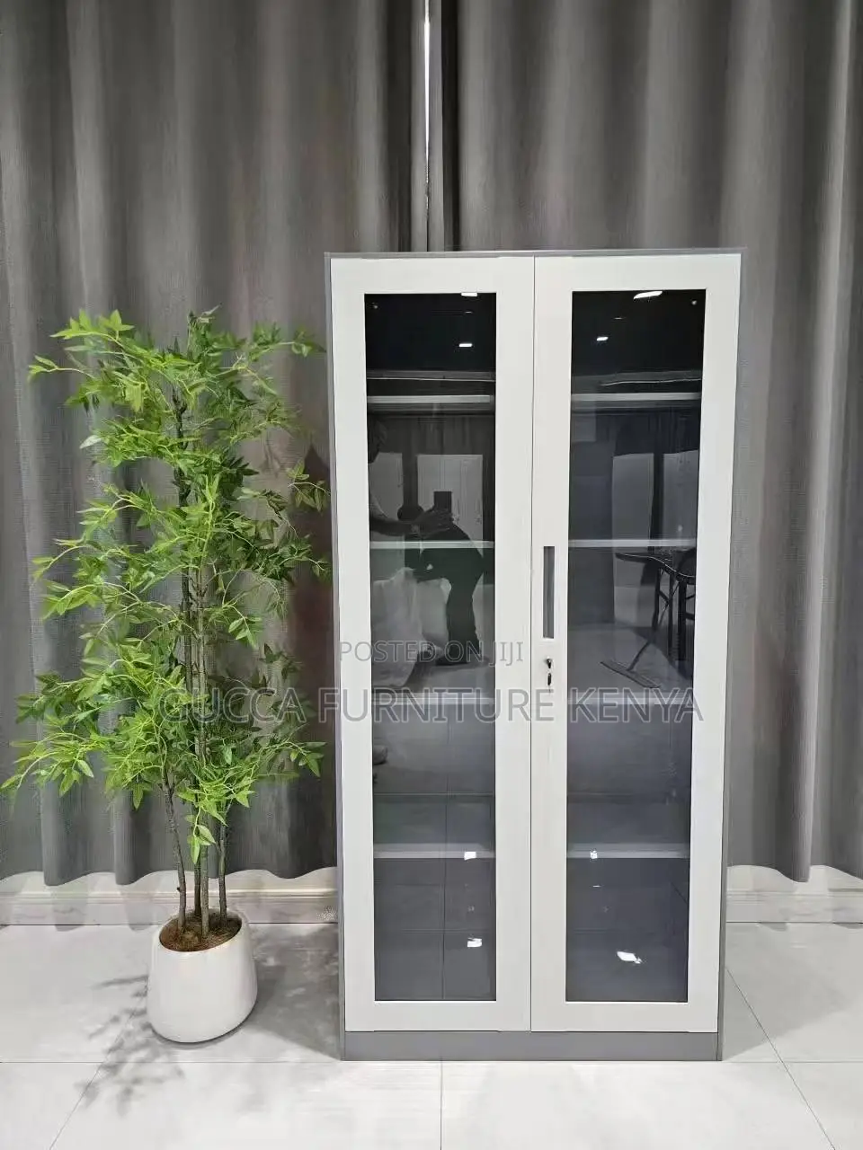 Lockable Glass Front Storage Cabinet.