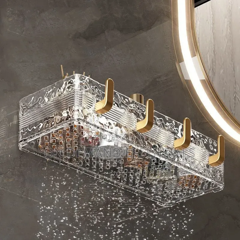 Acrylic Wave Patterned Storage Shelf With Gold Colored Hooks