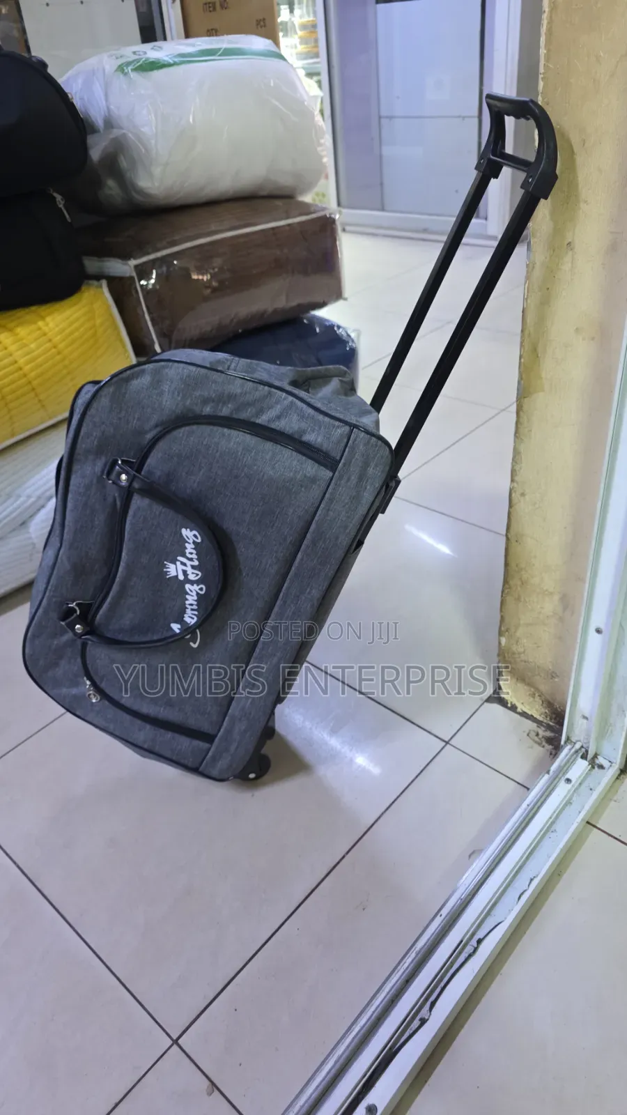 Grey Travelling Bag on Wheels With Wheels