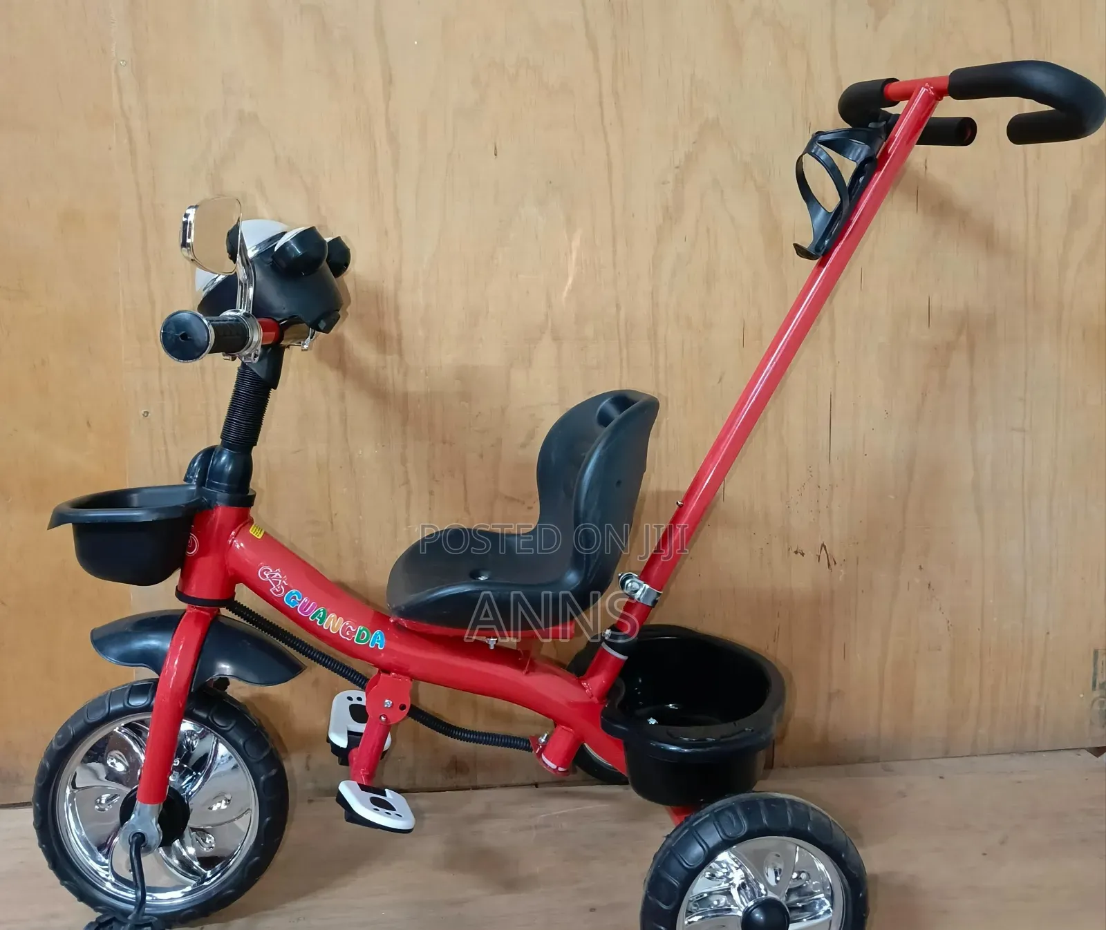 Children Ride on Tricycle