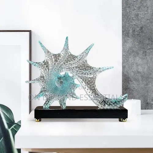 Blue Resin Conch Statue Resembling Sparkling Starfish