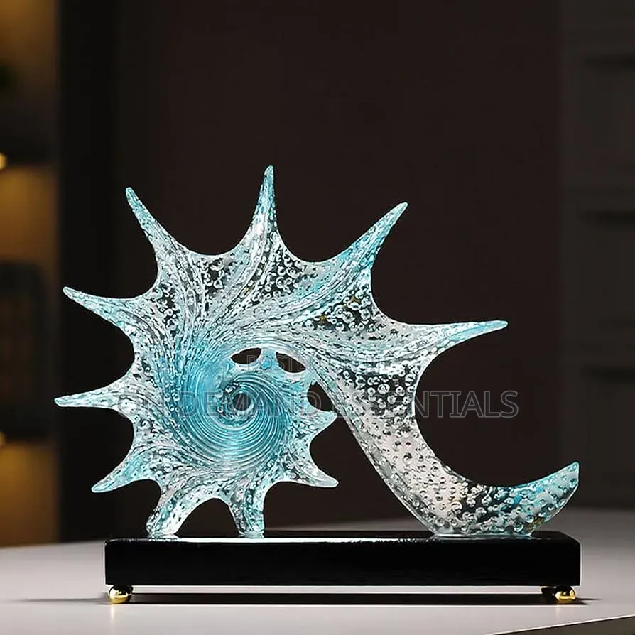 Blue Resin Conch Statue Resembling Sparkling Starfish