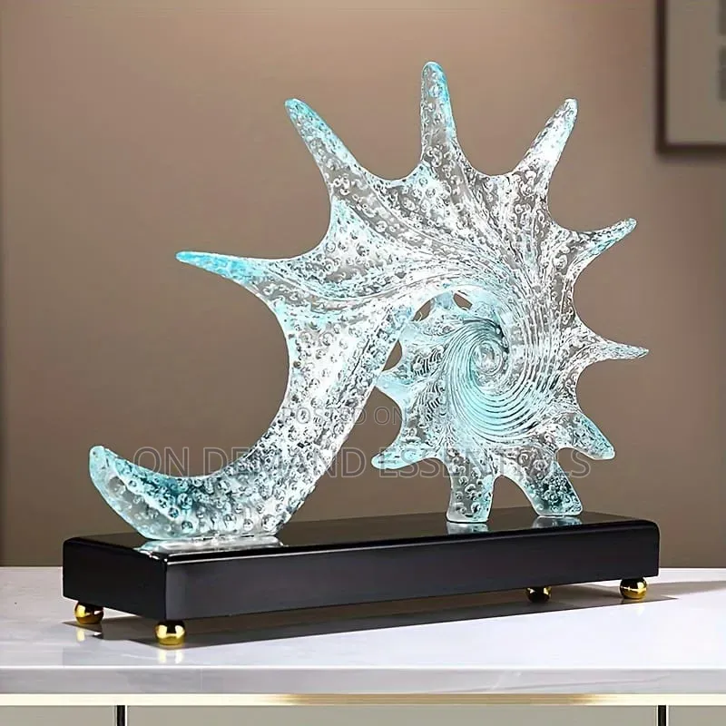 Blue Resin Conch Statue Resembling Sparkling Starfish