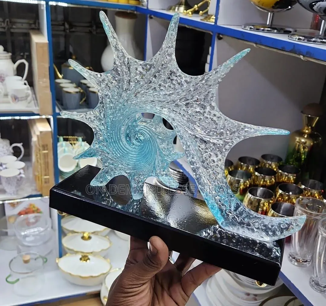 Blue Resin Conch Statue Resembling Sparkling Starfish