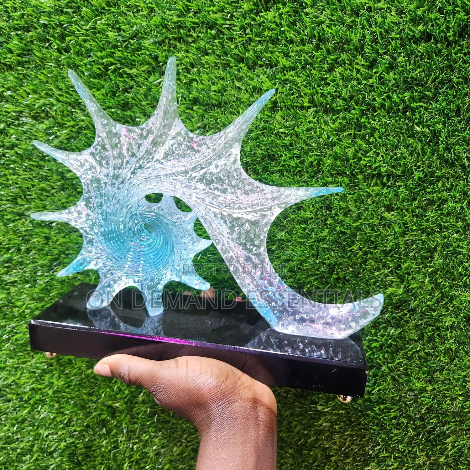 Blue Resin Conch Statue Resembling Sparkling Starfish