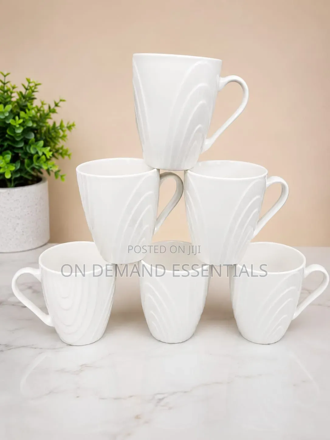 A Set of 6 White Mugs