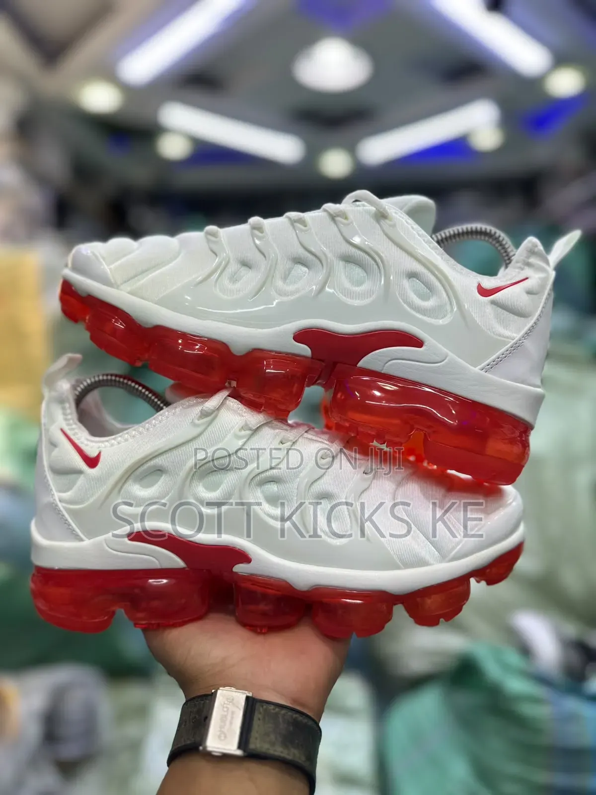 Nike Air VaporMax Plus Sneakers in a White and University Red