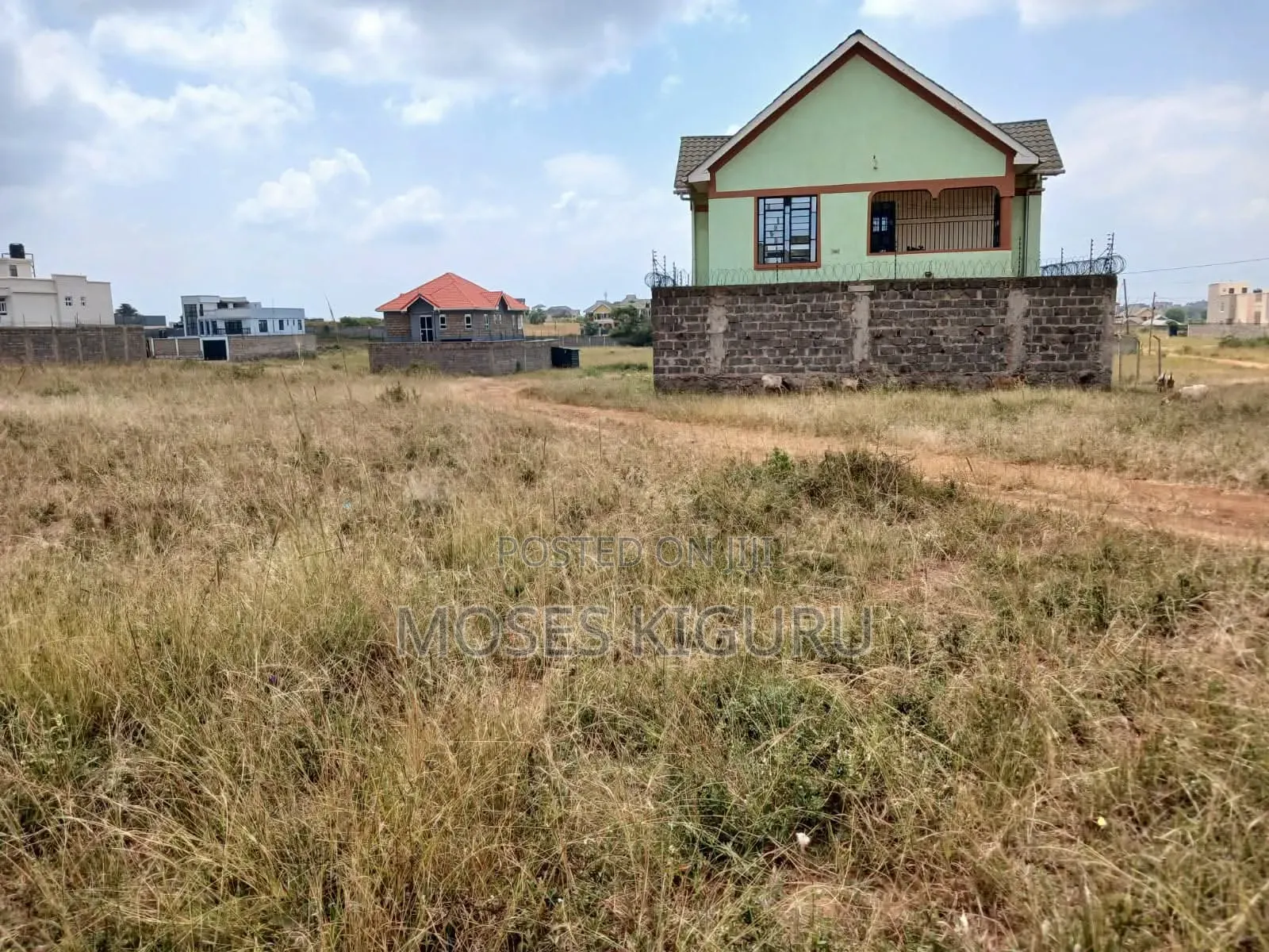 Tola Estate, Behind Mangu High School, 50x100 Plots.