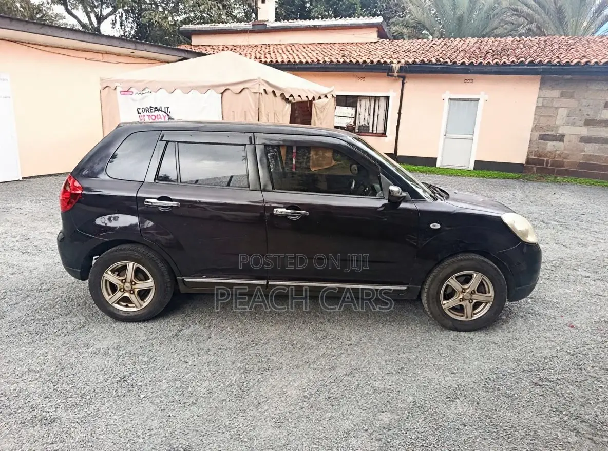Mazda Verisa 2011 Maroon