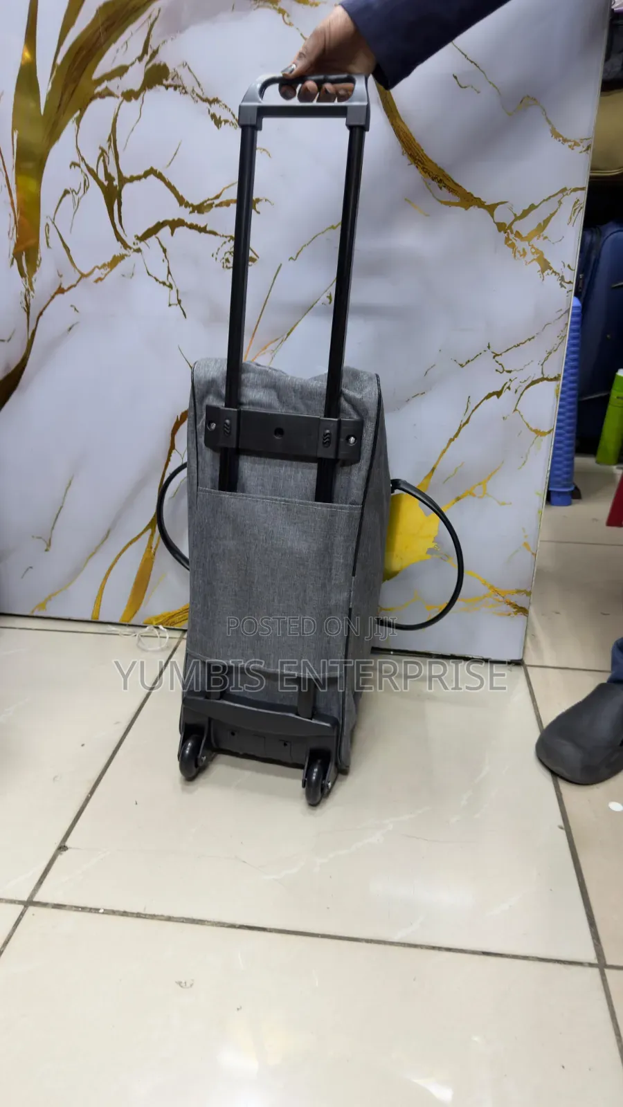 Grey Duffle Bags With Trolley Wheels